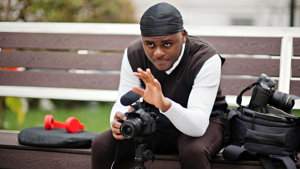 Happy photographer with camera